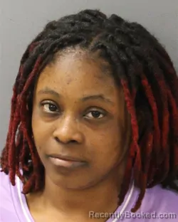 Mugshot of KIMYA DIOMONI NELSON booked in Guilford County, North Carolina on March 31, 2026