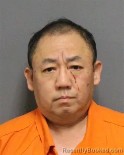 Mugshot of KEVIN KHOA NGUYEN booked in Guilford County, North Carolina on March 14, 2026