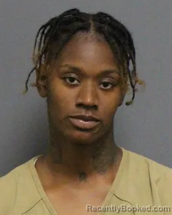 Mugshot of KRYSTAL DESIRAE JAMAE WASHINGTON-RICHMOND booked in Guilford County, North Carolina on July 1, 2026
