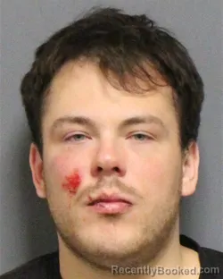 Mugshot of LANDON JACOB MILLER booked in Guilford County, North Carolina on March 21, 2026