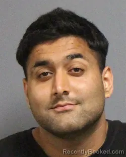 Mugshot of Muhammad Ali booked in Guilford County, North Carolina on September 9, 2026