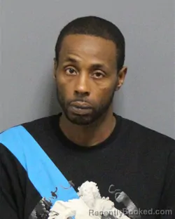 Mugshot of Michael Akiem Cooper booked in Guilford County, North Carolina on August 22, 2026