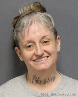 Mugshot of MICHELLE CONSUELA CARDEN booked in Guilford County, North Carolina on March 22, 2026