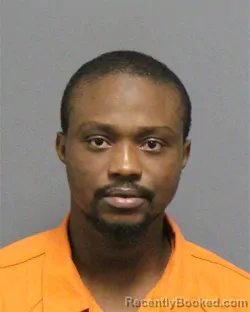 Mugshot of Mudasiru Afeez Olawale booked in Guilford County, North Carolina on August 27, 2026