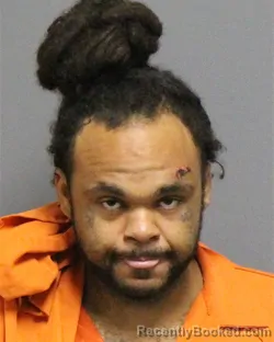 Mugshot of Michael Eltorres Stirli Robinson booked in Guilford County, North Carolina on August 27, 2026