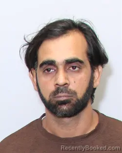 Mugshot of Muhammad Kashif Razaq booked in Guilford County, North Carolina on September 12, 2026