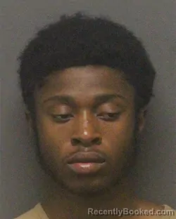 Mugshot of NATAVIOUS MAHKI JOHNSON booked in Guilford County, North Carolina on July 14, 2026
