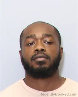 Mugshot of Raekwon Stepfon Burgess booked in Guilford County, North Carolina on October 6, 2026