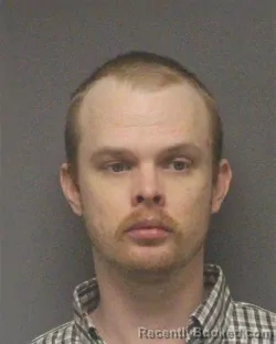 Mugshot of RILEY MARK AUSTIN MCCRACKEN booked in Guilford County, North Carolina on March 11, 2026