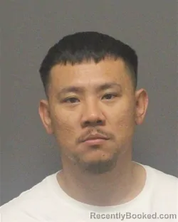 Mugshot of RACHAN KING SOMSAVANH booked in Guilford County, North Carolina on March 18, 2026