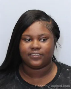 Mugshot of SHAWNEQA DEAISHA ZIMMERMAN booked in Guilford County, North Carolina on March 27, 2026