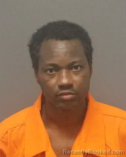 Mugshot of TOGNISSE DOROTHE AGOSSOUNON KPENOU booked in Guilford County, North Carolina on June 19, 2026