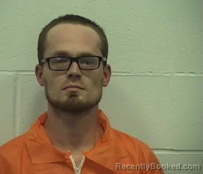 Mugshot of AUSTIN J COMER