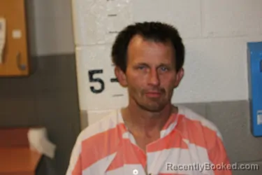 Mugshot of MATHEW CURTIS booked in Schuyler County, Illinois on March 28, 2026