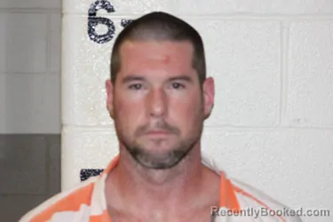 Mugshot of DREW MATHEWSON booked in Schuyler County, Illinois on April 12, 2026