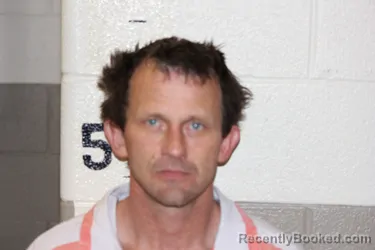 Mugshot of MATHEW CURTIS booked in Schuyler County, Illinois on April 14, 2026