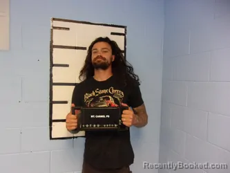 Mugshot of CAGE M WILLIS booked in Wabash County, Illinois on March 31, 2026