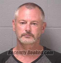 Mugshot of MATTHEW W DUHON