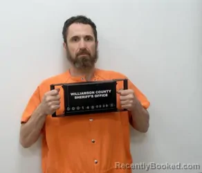 Mugshot of JUSTIN ALLEN BURNETT booked in Williamson County, Illinois on March 29, 2026