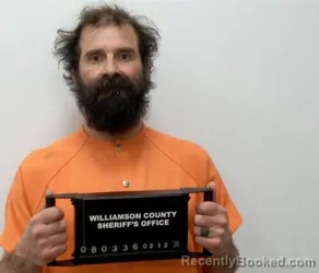 Mugshot of TRAVIS MICHAEL OWENS booked in Williamson County, Illinois on March 26, 2026