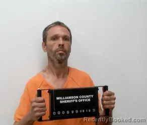 Mugshot of Seth Eugene Riddle booked in Williamson County, Illinois on August 18, 2026