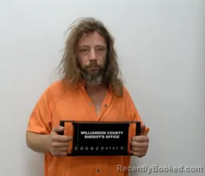 Mugshot of JOHN CLAYTON BASSETT