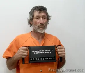 Mugshot of RUSSELL LEE DAVIS booked in Williamson County, Illinois on March 24, 2026