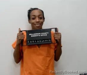 Mugshot of DESHARMQUE SHATINA HENDERSON booked in Williamson County, Illinois on May 26, 2026