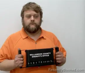 Mugshot of CHRISTOPHER JAMES RHODES booked in Williamson County, Illinois on March 19, 2026