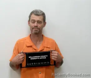 Mugshot of TREVOR LINDSAY MILLS booked in Williamson County, Illinois on March 26, 2026