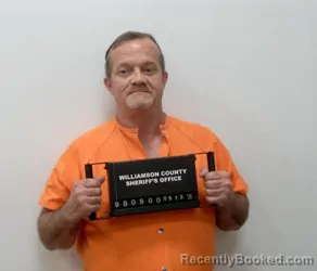 Mugshot of ERIC WAYNE ADERHOLT booked in Williamson County, Illinois on May 22, 2026