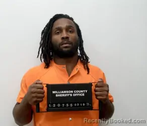 Mugshot of JUSTIN IAN IVY booked in Williamson County, Illinois on March 19, 2026