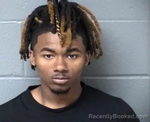 Mugshot of LONDON P TOLLIVER booked in Woodford County, Illinois on April 26, 2026