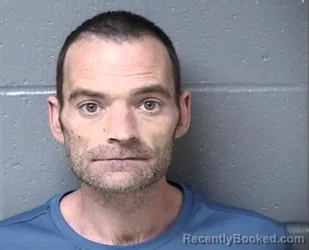 Mugshot of JONATHON D MULLINS booked in Woodford County, Illinois on July 8, 2026