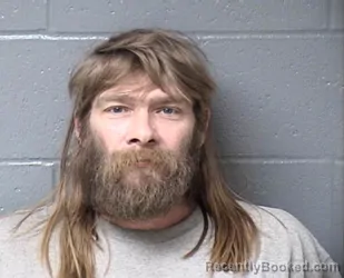 Mugshot of GEORGE D MORELAND