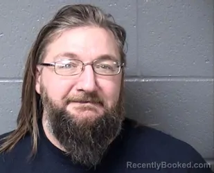 Mugshot of JEREMIAH J NEUMILLER