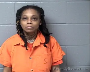 Mugshot of TYISSHA L CARRUTHERS