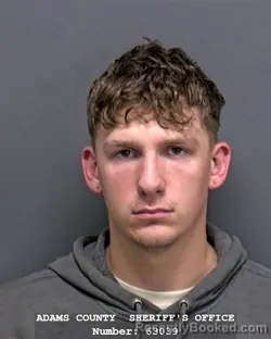 Mugshot of CALEB ANDREW RUST booked in Adams County, Indiana on March 31, 2026