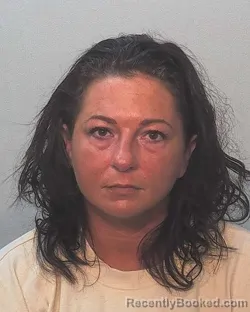 Mugshot of Kelly Katherine Urrutia booked in Allen County, Indiana on March 11, 2026