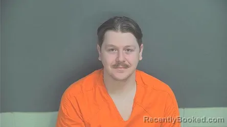 Mugshot of Milan Reitz booked in Boone County, Indiana on March 21, 2026