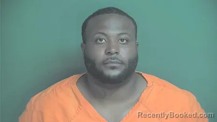 Mugshot of Mensah Bonman booked in Boone County, Indiana on June 24, 2026