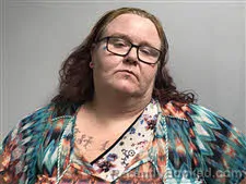 Mugshot of Ginger Annette Sharp booked in Haywood County, North Carolina on March 24, 2026