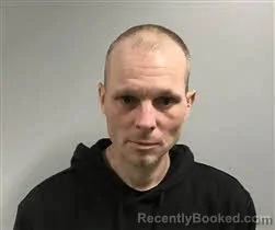 Mugshot of Justin Lyle Ward booked in Haywood County, North Carolina on August 24, 2026