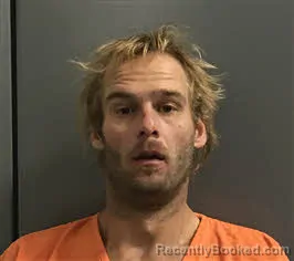Mugshot of Evan John Simons booked in Haywood County, North Carolina on October 21, 2026