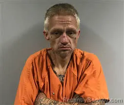 Mugshot of Travis Edward Hensley booked in Haywood County, North Carolina on August 21, 2026