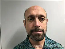 Mugshot of Jonathon Andrew Thomas booked in Haywood County, North Carolina on March 27, 2026