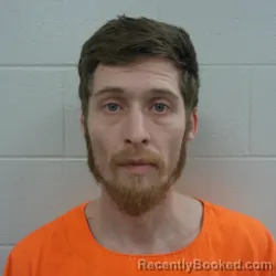 Mugshot of Dustin Jacob Michael Chapman booked in Carroll County, Indiana on March 18, 2026