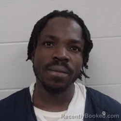 Mugshot of Junior Elie booked in Carroll County, Indiana on March 30, 2026