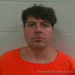 Mugshot of Travis Edward Depew booked in Carroll County, Indiana on October 20, 2026