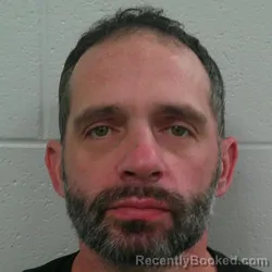 Mugshot of Casey Caine Brown booked in Carroll County, Indiana on October 23, 2026